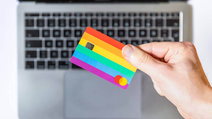 someone holding their credit/debit card